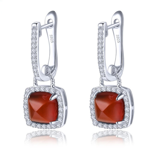 sugar-loaf cut hessonite garnet dangle earrings in rhodium over sterling silver