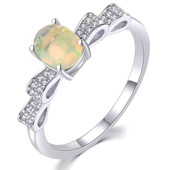 ethiopian opal and white zircon rhodium over sterling silver bow ring