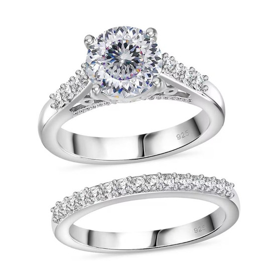 front view of 120 facet strontium titanate moissanite and sapphire bridal set in rhodium over sterling silver