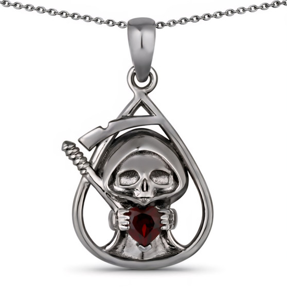 front view of grim reaper pendant holding heart shaped garnet in black rhodium plated sterling silver with gothic fine jewelry design