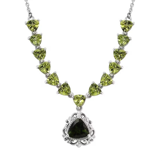 close up of moldavite and trillion peridot drop necklace in rhodium over sterling silver