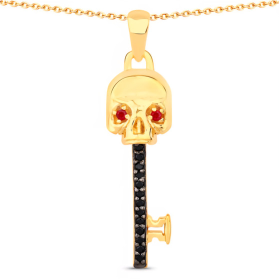 front view of key pendant with black spinel and ruby eyes in 18k yellow gold over sterling silver