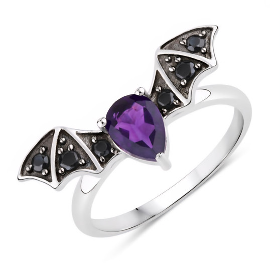 front view of bat wing ring with amethyst and black spinel in black and white rhodium over sterling silver