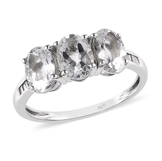 front view of goshenite and faceted diamond trilogy ring in rhodium over sterling silver