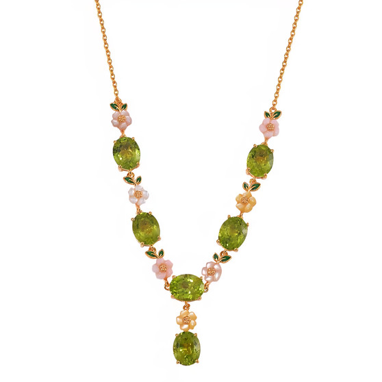 front view of peridot and mother of pearl floral necklace in 18k yellow gold over silver