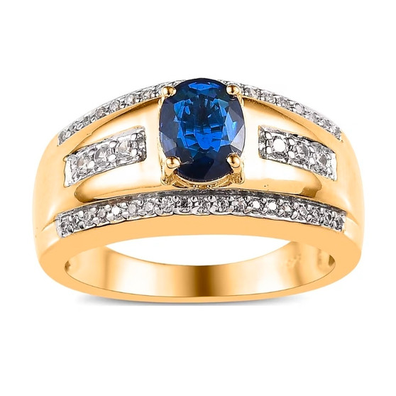 front view of blue spinel and white zircon gent’s ring featuring oval blue center stone with diamond accent channels