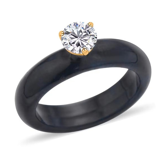 front view of round moissanite solitaire on black jade band in 18k yellow gold over sterling silver