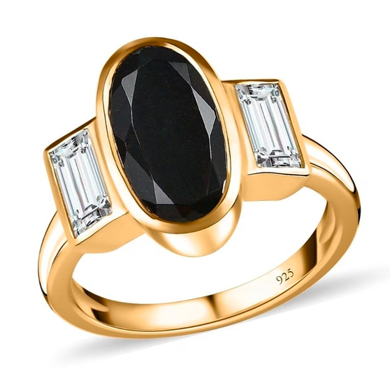 front view of black tourmaline oval and moissanite bezel set three stone ring in 18k yellow gold over sterling silver
