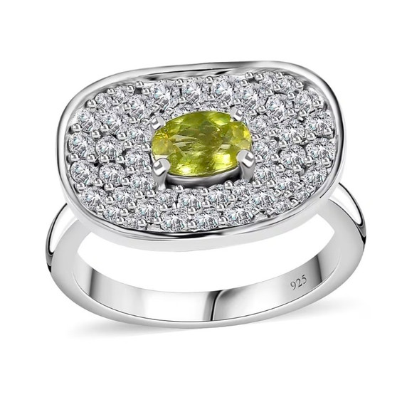 front view of a concave ring featuring an oval sphene center surrounded by pavé moissanite in rhodium over sterling silver