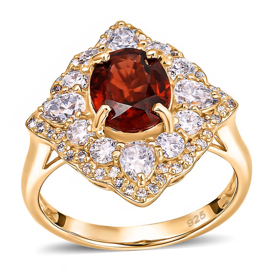 front view of red zircon and moissanite halo ring in 18k yellow gold over sterling silver
