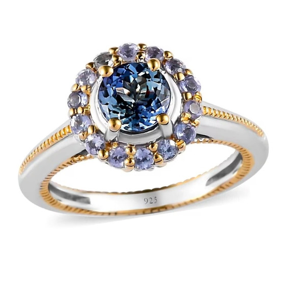 front view of unheated tanzanite and zircon round halo ring in two-tone 18k yellow gold and rhodium over sterling silver