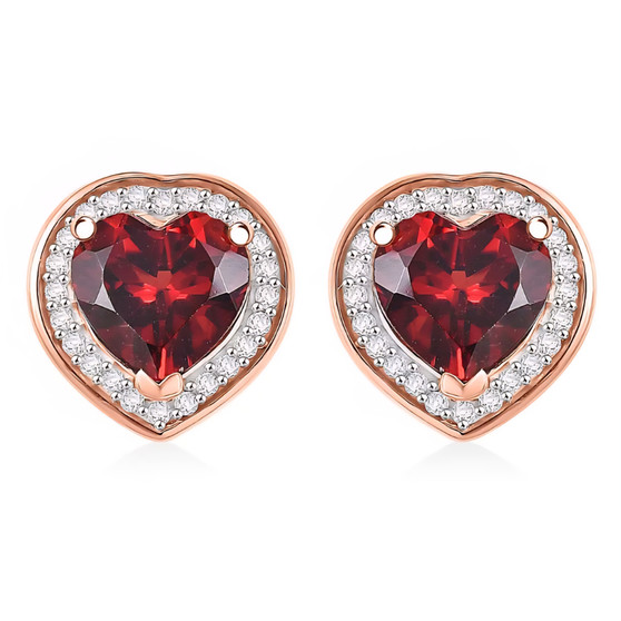 front view of heart cut garnet and moissanite halo stud earrings in 18k rose gold over sterling silver