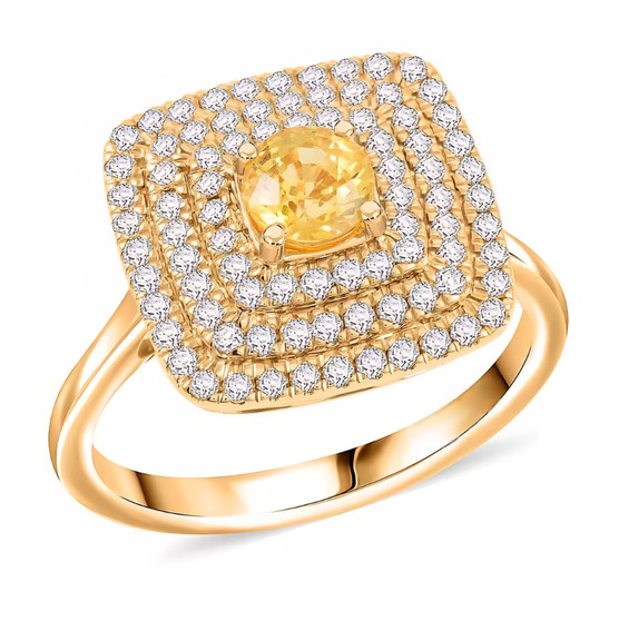 angled view of yellow sapphire and diamond triple halo ring in 14k yellow gold