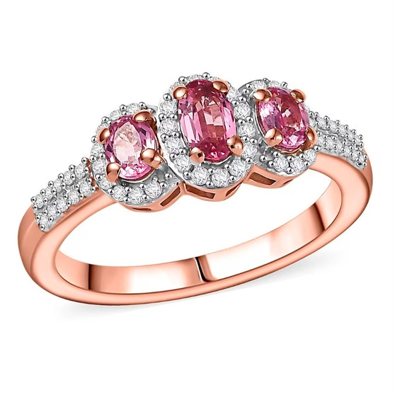 front view of pink spinel oval and moissanite trilogy halo ring in 18k rose gold over sterling silver