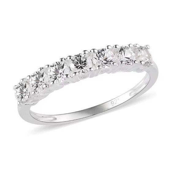 front view of white zircon seven stone band ring in rhodium over sterling silver