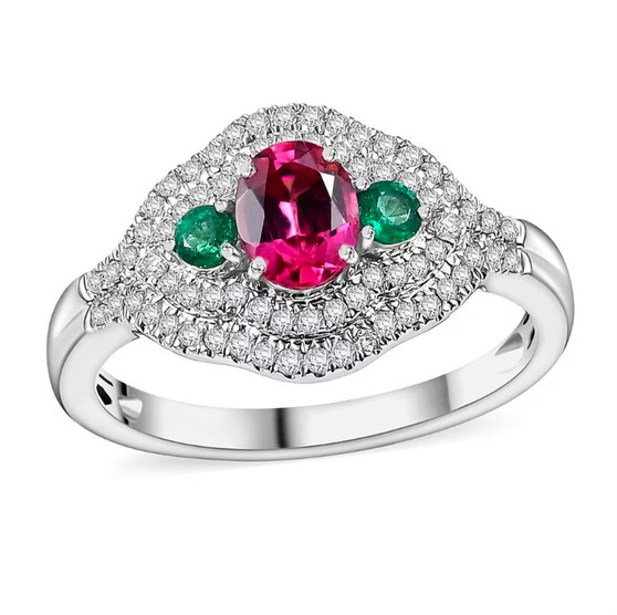 front view of mahenge pink spinel emerald and diamond three stone ring in 950 platinum