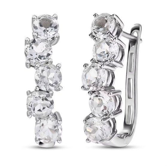 front view of white topaz wavy j-hoop earrings in rhodium over sterling silver