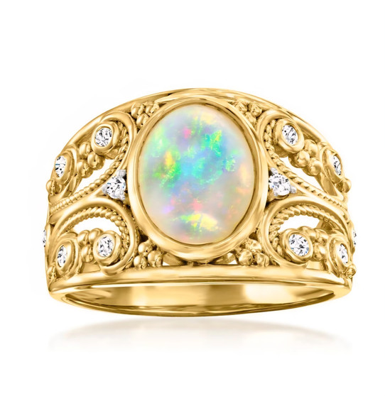 oval ethiopian opal and white topaz ring in yellow gold over sterling silver