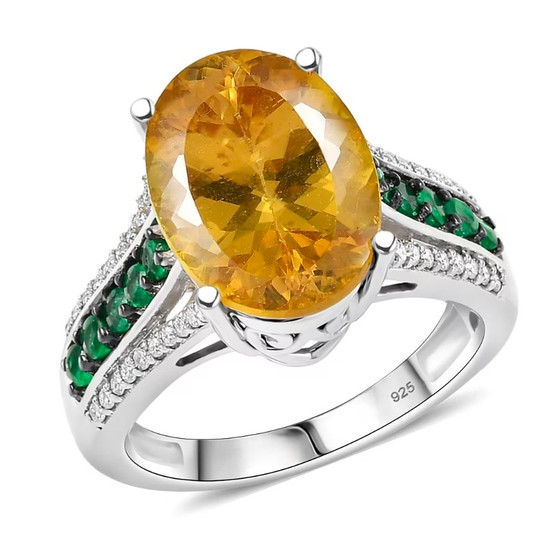 front view of yellow apatite oval emerald and moissanite ring in rhodium over sterling silver