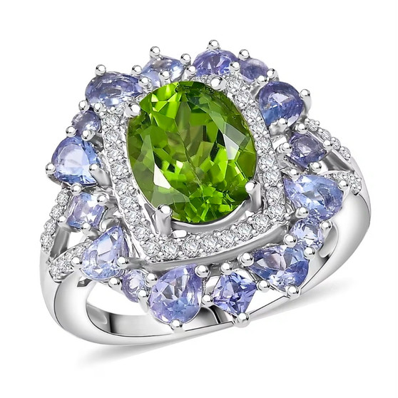 front view of peridot tanzanite and zircon double halo ring in rhodium over sterling silver