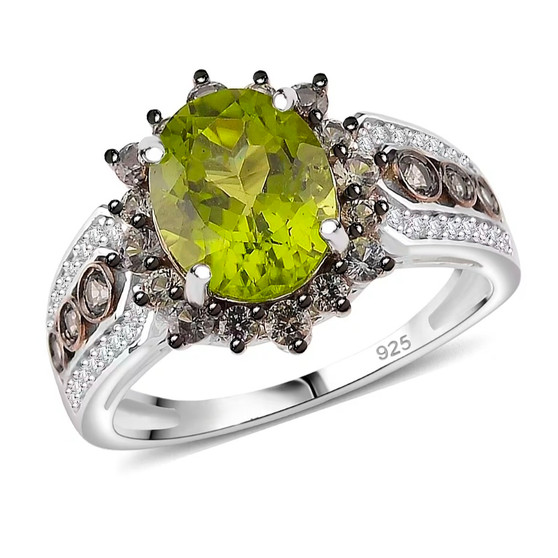 front view of peridot green sapphire and zircon halo ring in two-tone rhodium over sterling silver