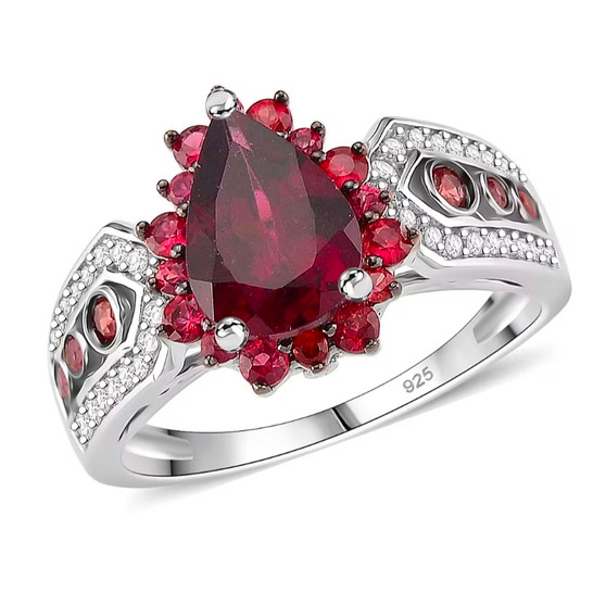 front view of rhodolite red sapphire and zircon halo ring in rhodium over sterling silver
