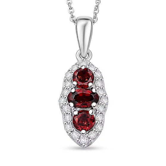 front view of red zircon and moissanite three stone halo pendant necklace in rhodium over sterling silver