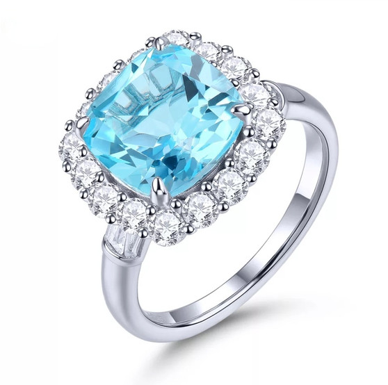 Blue-topaz-white-zircon-cushion-halo-silver-ring-stock-GGJ5203