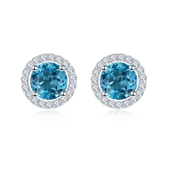 swiss blue topaz and white zircon round halo stud earrings in rhodium over sterling silver