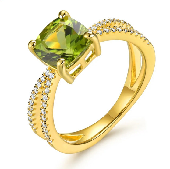 peridot and white zircon split shank ring in 18k yellow gold over sterling silver