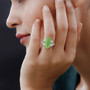 green jade and chrome diopside ring in rhodium over sterling silver worn on a hand