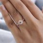 morganite pink tourmaline and white zircon womens wedding ring in 18k rose gold over sterling silver worn on a hand