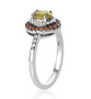 side view of sphene with white and brown zircon halo ring in rhodium over sterling silver