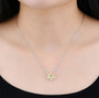 ethiopian opal and chrome diopside flower necklace in rhodium over sterling silver worn around the neck