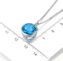 bezel set swiss blue topaz 11mm round solitaire pendant necklace in rhodium over sterling silver shown for size comparison