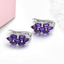 side view of amethyst cluster j-hoop earrings in rhodium over sterling silver