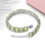 clasp detail of peridot mixed oval and emerald cut tennis bracelet in rhodium over sterling silver