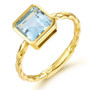 aquamarine and emerald cut bezel set solitaire ring in solid 18k yellow gold