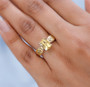 heliodor solitaire ring in 18k yellow gold and rhodium over 925 sterling silver worn on a hand