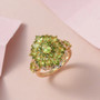 vesuvianite and chrome diopside cluster ring in 18k yellow gold over sterling silver shown in a lifestyle photo