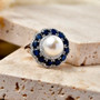 white freshwater pearl blue sapphire and moissanite triple halo ring in rhodium over sterling silver live studio