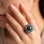 tahitian pearl and guatemalan jadeite carved flower ring with rhodium over sterling silver worn on a hand