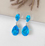 blue quartz triplet drop earrings in rhodium over sterling silver shown in a lifestyle photo