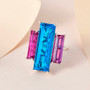 blue and pink quartz triplet trilogy cocktail ring in rhodium over sterling silver shown in a lifestyle photo