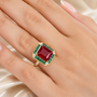 fissure filled ruby emerald and white zircon emerald cut halo ring in 18k vermeil yellow gold over sterling silver on hand model