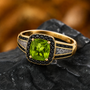 peridot with meteorite inlay and black spinel halo ring in 18k vermeil yellow gold and black rhodium prong tips over sterling silver live studio