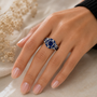 lab created blue sapphire and white zircon mosaic ring in rhodium over sterling silver on hand model