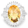 oval citrine statement ring with white topaz baguette accents
