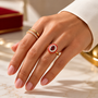 red and white zircon flower ring with red enamel in 18k vermeil yellow gold over sterling silver on hand model