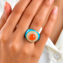 carnelian and white zircon dome ring with blue enamel in 18k vermeil yellow gold over sterling silver on hand model
